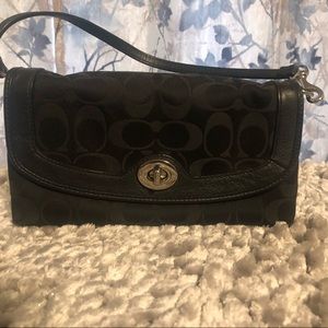 Coach EUC small shoulder purse in signature canvas.
